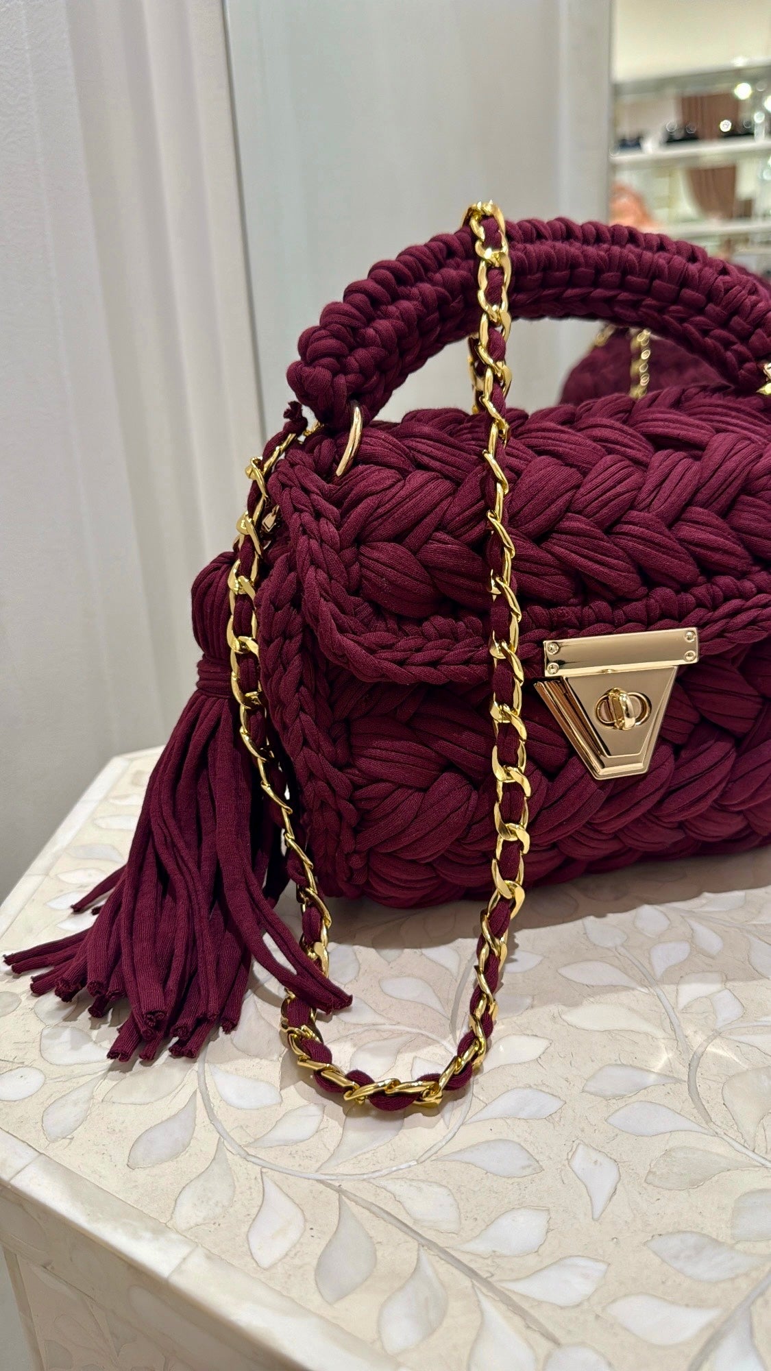 The cove crochet clutch, wine