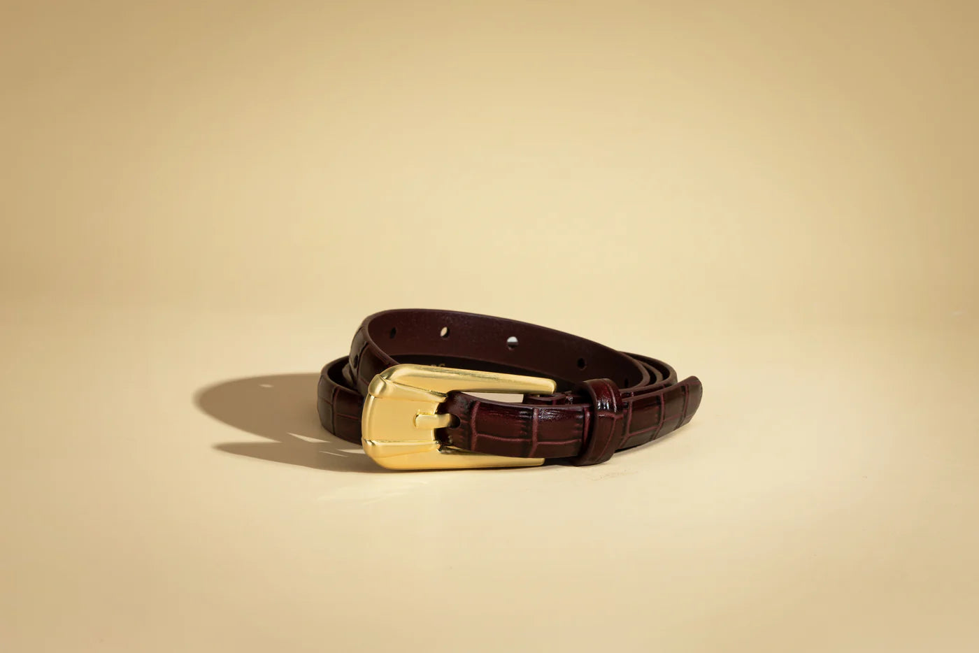 The carini belt, cranberry