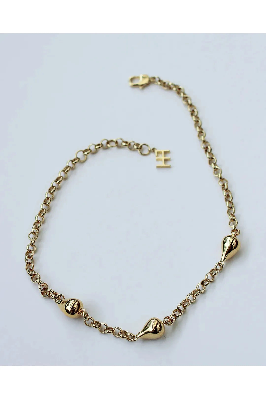 fluid ball necklace, gold