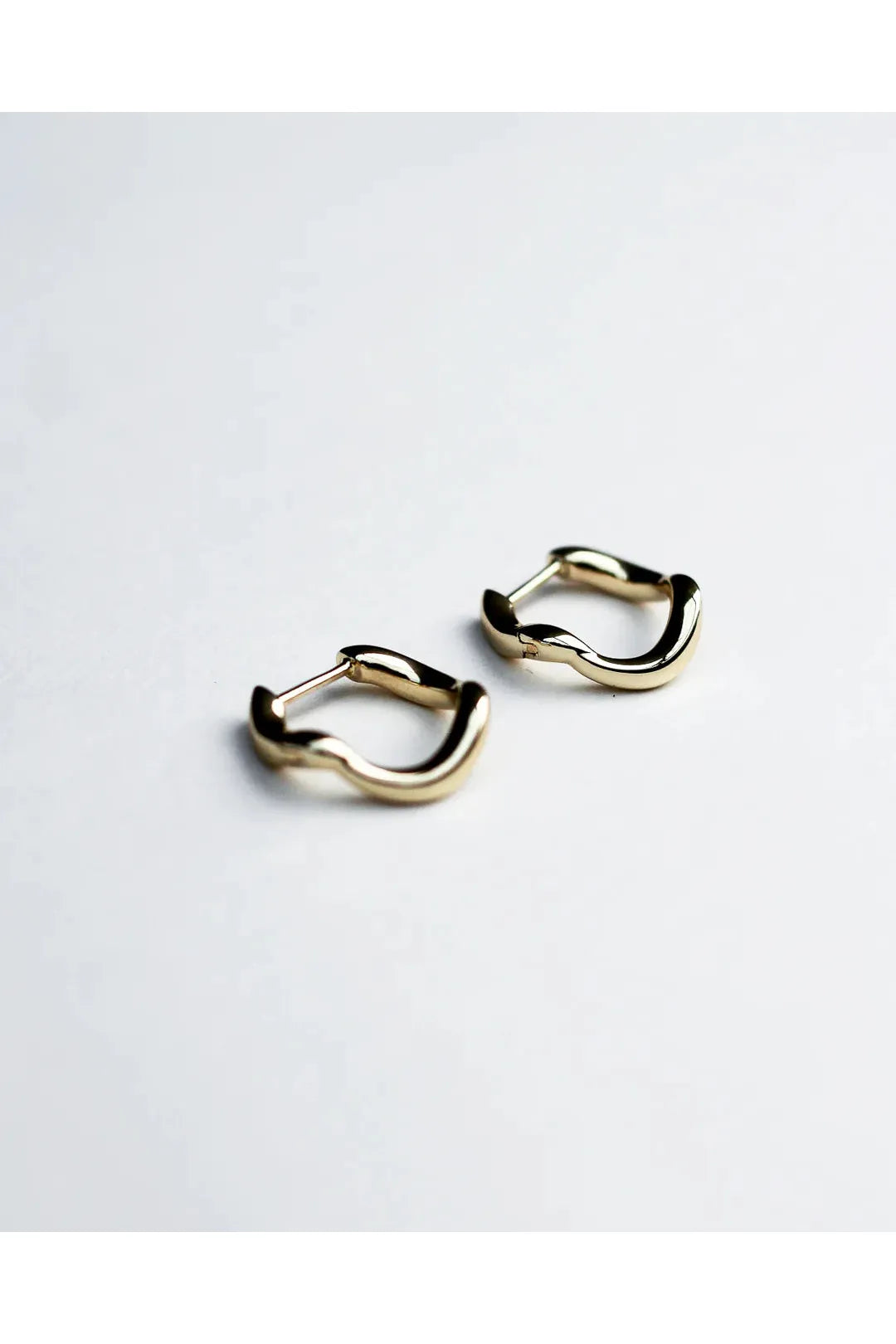 wave huggies, gold plated